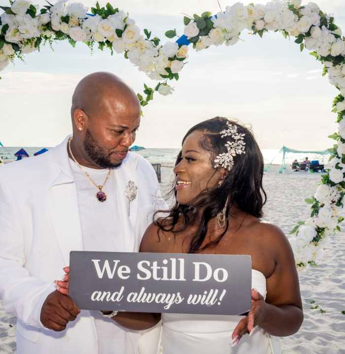 Couple at vow renewal ceremony on the beach